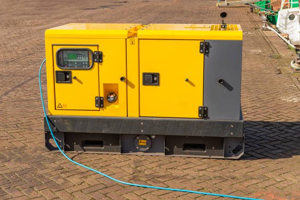 Yellow portable generator with blue cable